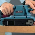 Превью картинка Ленточная шлифмашина Makita 9910